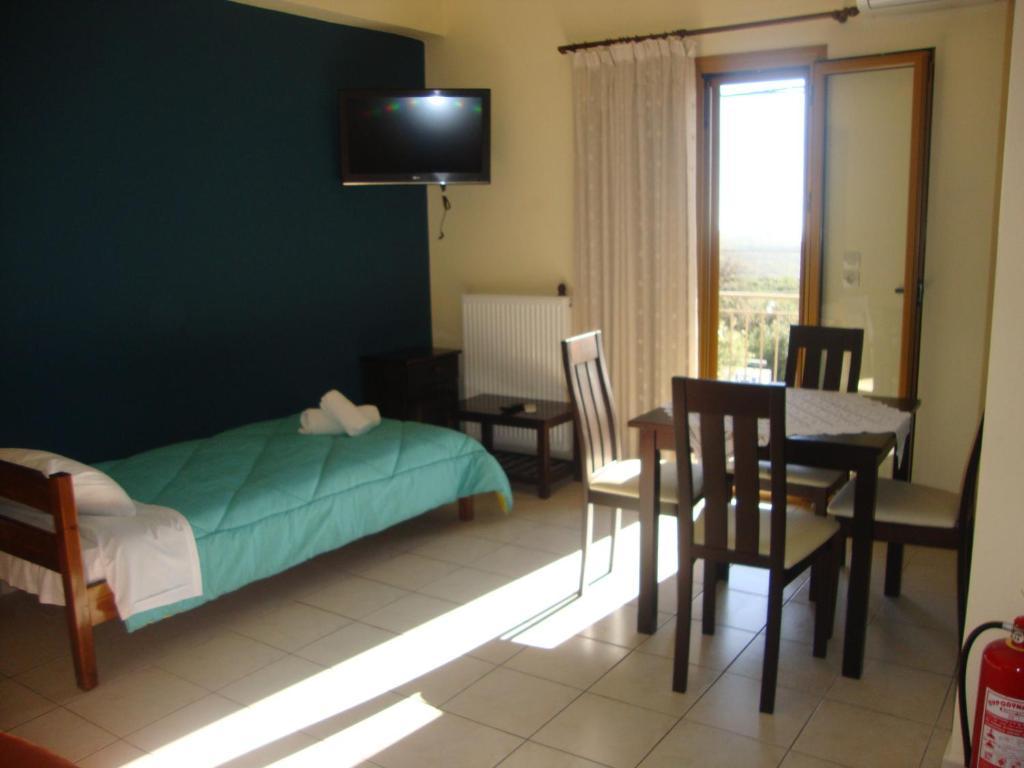 Kafiona Guesthouse Pírgos Dhiroú Oda fotoğraf